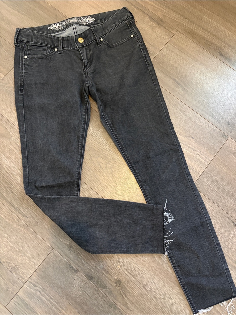 Express Women’s Straight Leg Jeans in Washed Black with Distressed Hem
